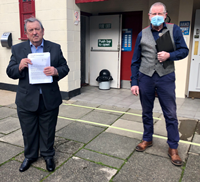 Councillor Ronnie Ahlfeld chairman of the Inverclyde Licensing Board with Brett Clough owner of the Cardwell Bar in Gourock
